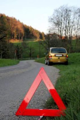 car trouble with hazard sign